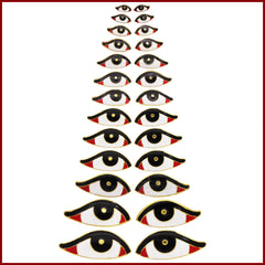 Set of decorative eye-shaped items on a white background