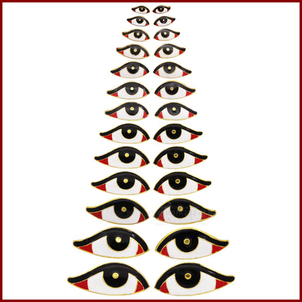 Set of decorative eye-shaped items on a white background