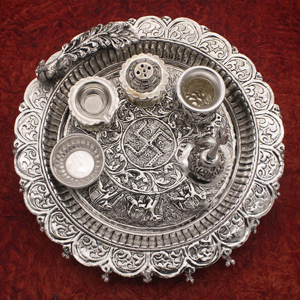 Traditional Silver-Plated Peacock Pooja Thali Set with Swastik Design, Bell, Diya Holder, Kalash & Incense Stand for Daily Worship and Festivals (12 inch diameter )