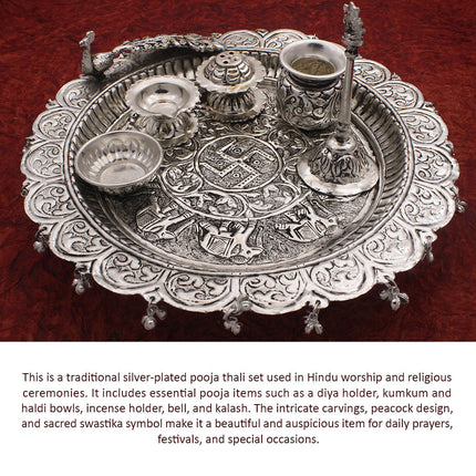 Traditional Silver-Plated Peacock Pooja Thali Set with Swastik Design, Bell, Diya Holder, Kalash & Incense Stand for Daily Worship and Festivals (12 inch diameter )