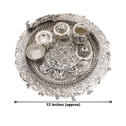 Traditional Silver-Plated Peacock Pooja Thali Set with Swastik Design, Bell, Diya Holder, Kalash & Incense Stand for Daily Worship and Festivals (12 inch diameter )