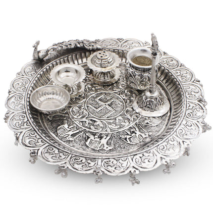Traditional Silver-Plated Peacock Pooja Thali Set with Swastik Design, Bell, Diya Holder, Kalash & Incense Stand for Daily Worship and Festivals (12 inch diameter )